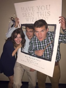 Bridget Chalifour, Mark DeSantis and Connor Hartzell enjoy the Yule Ball decorations. 