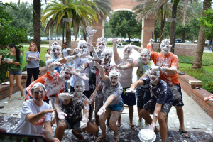 The Hume RAs rejoice after being collectively pied by their residents at Pie Your RA. 